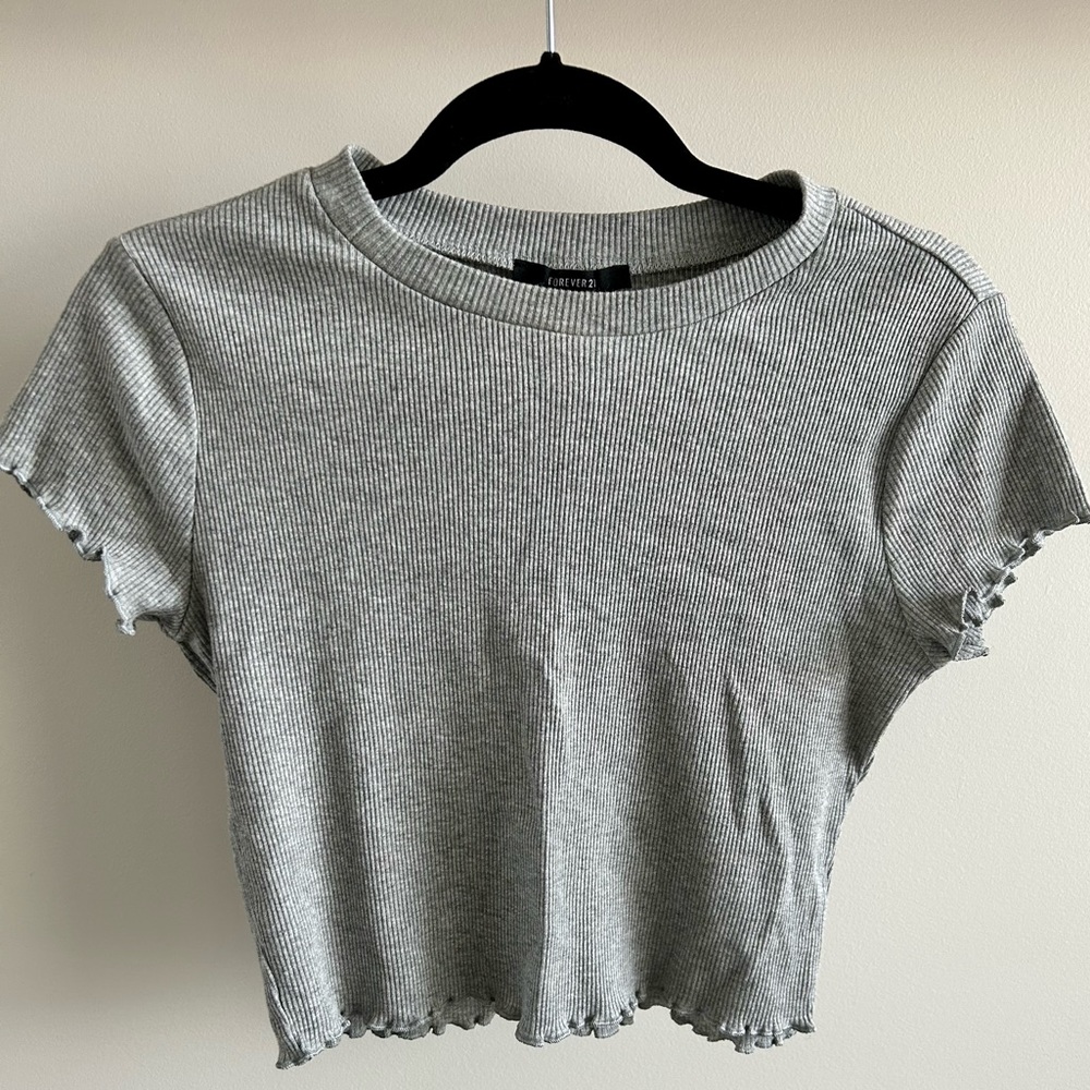 Ribbed gray cropped top with “lettuce” detailing on the hems